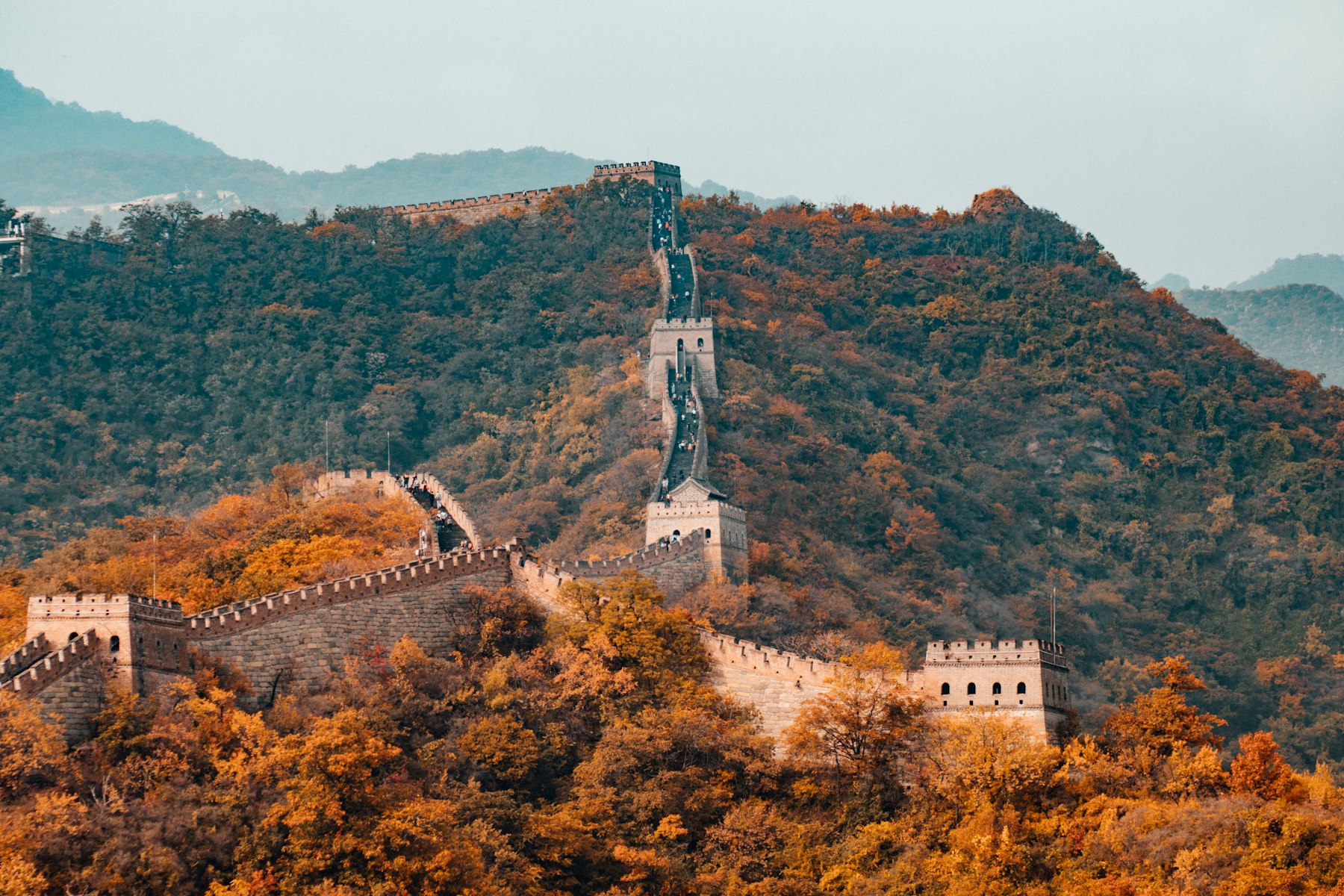 The Great Wall of China crossing autumn hills