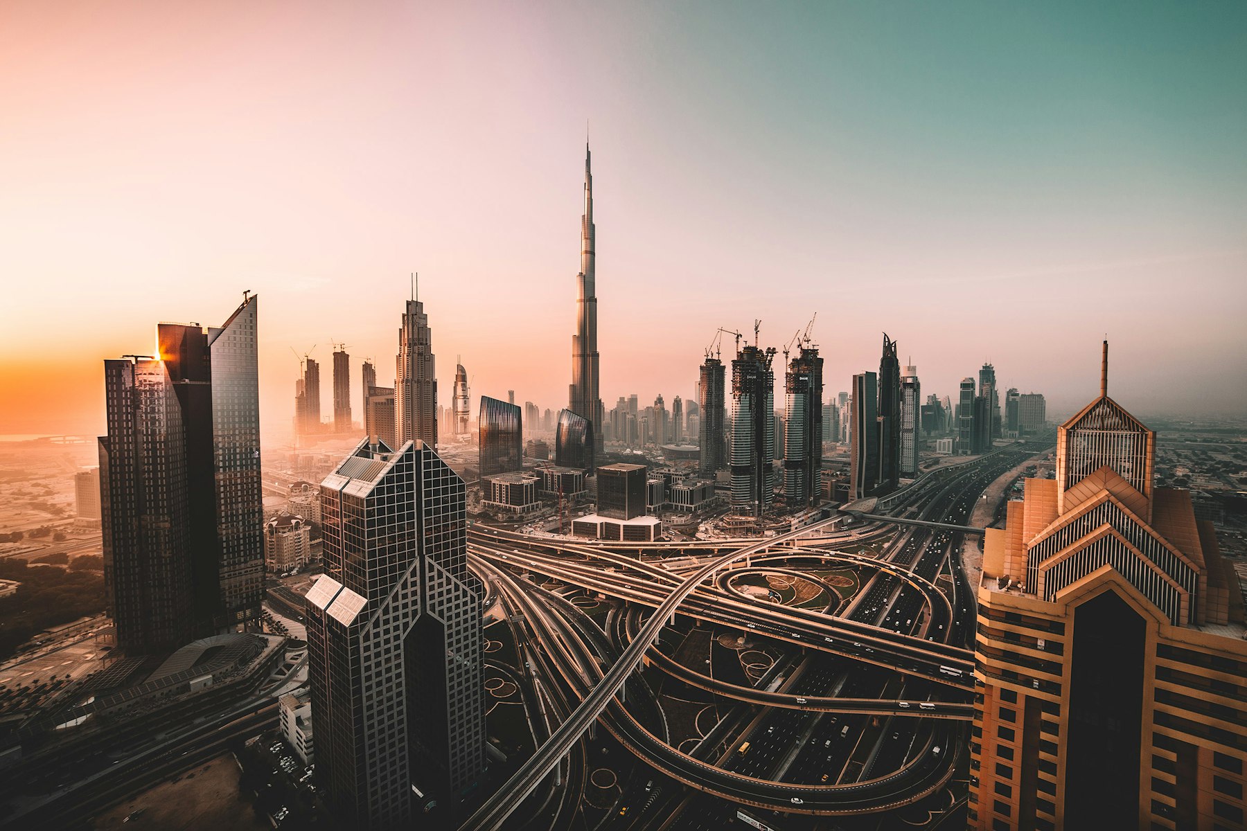 Dubai downtown skyline at sunset with Burj Khalifa